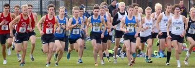 The men's cross country team starting a race.